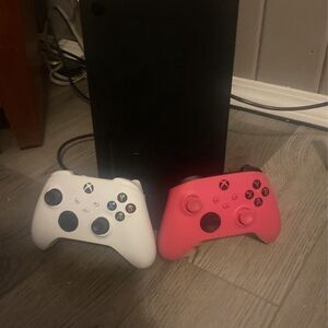 Xbox series X with 2 controllers